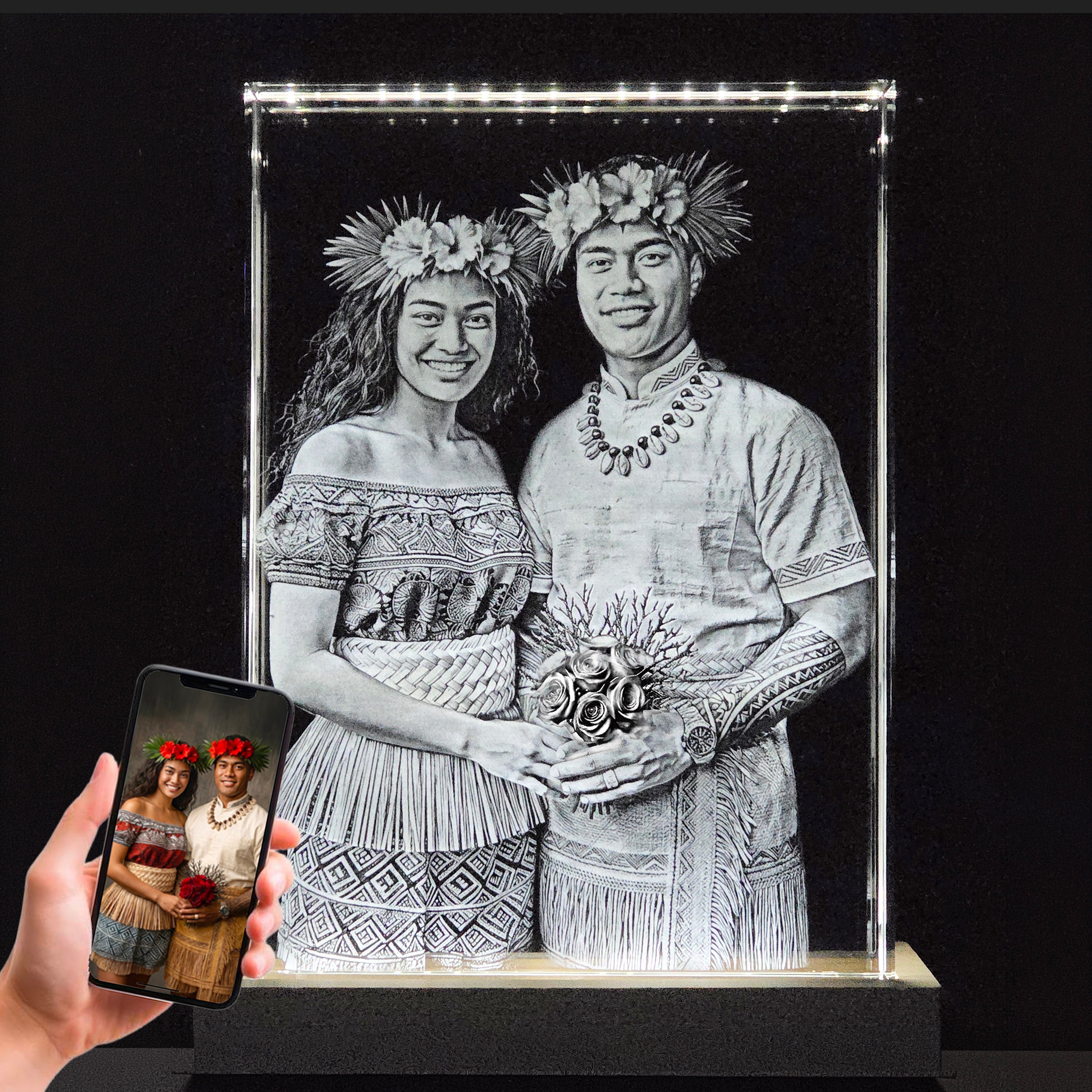 A giant 3D photo crystal rectangle shaped crystal with a Samoan couple laser engraved inside.